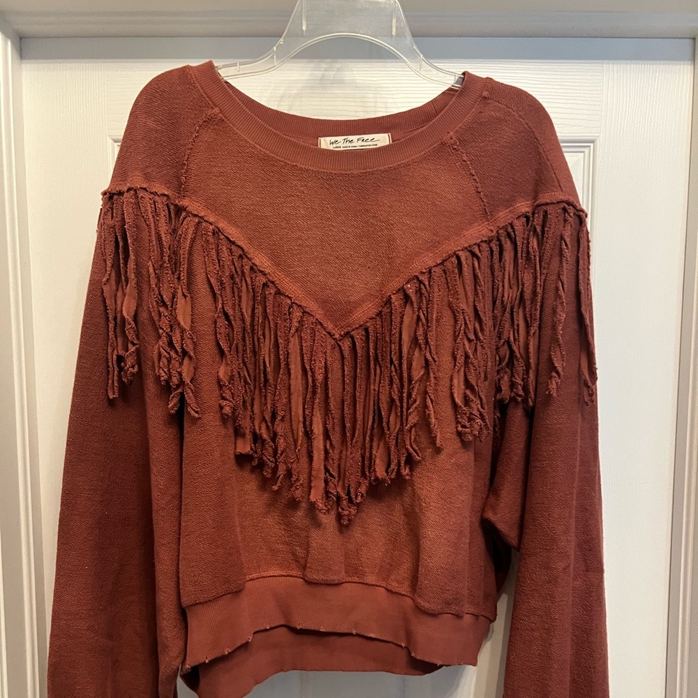 Free people fringe sweater never been worn